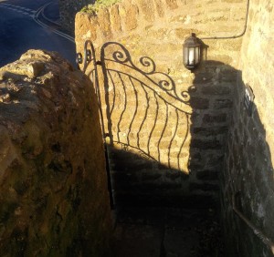 Early Spring Sunshine on one of Colleen's Gates Casts a shadow